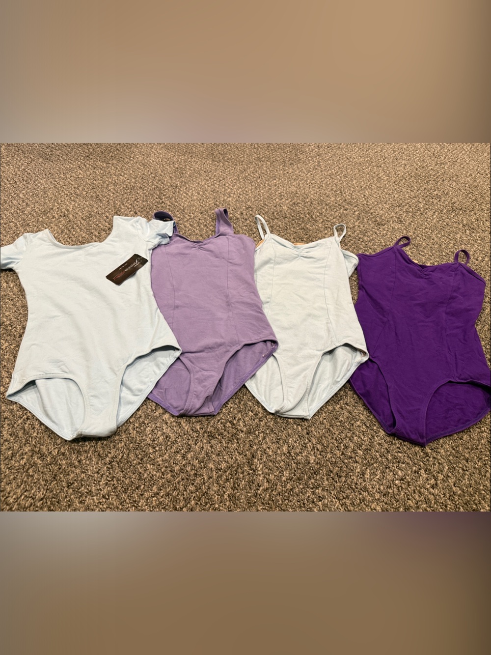 Theatricals size small leotards . 2 blue , lavender and purple .